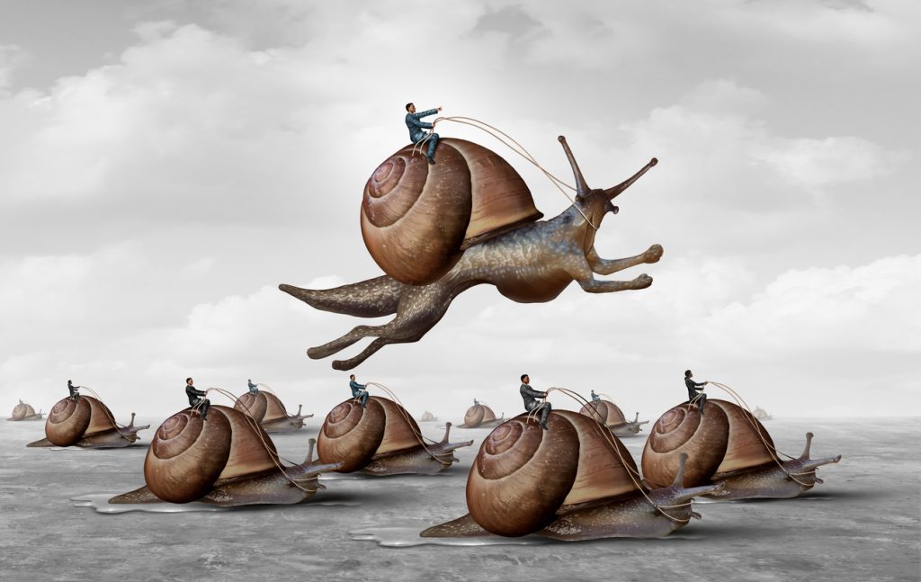 Business people on snails, racing against one another.